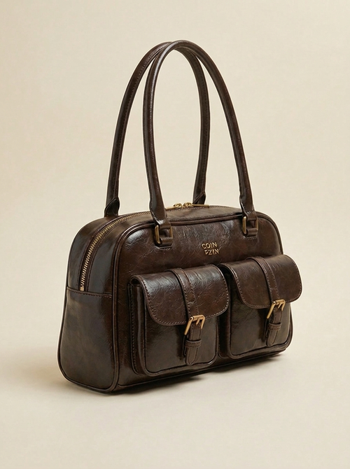 Bolso de cuero con múltiples bolsillos