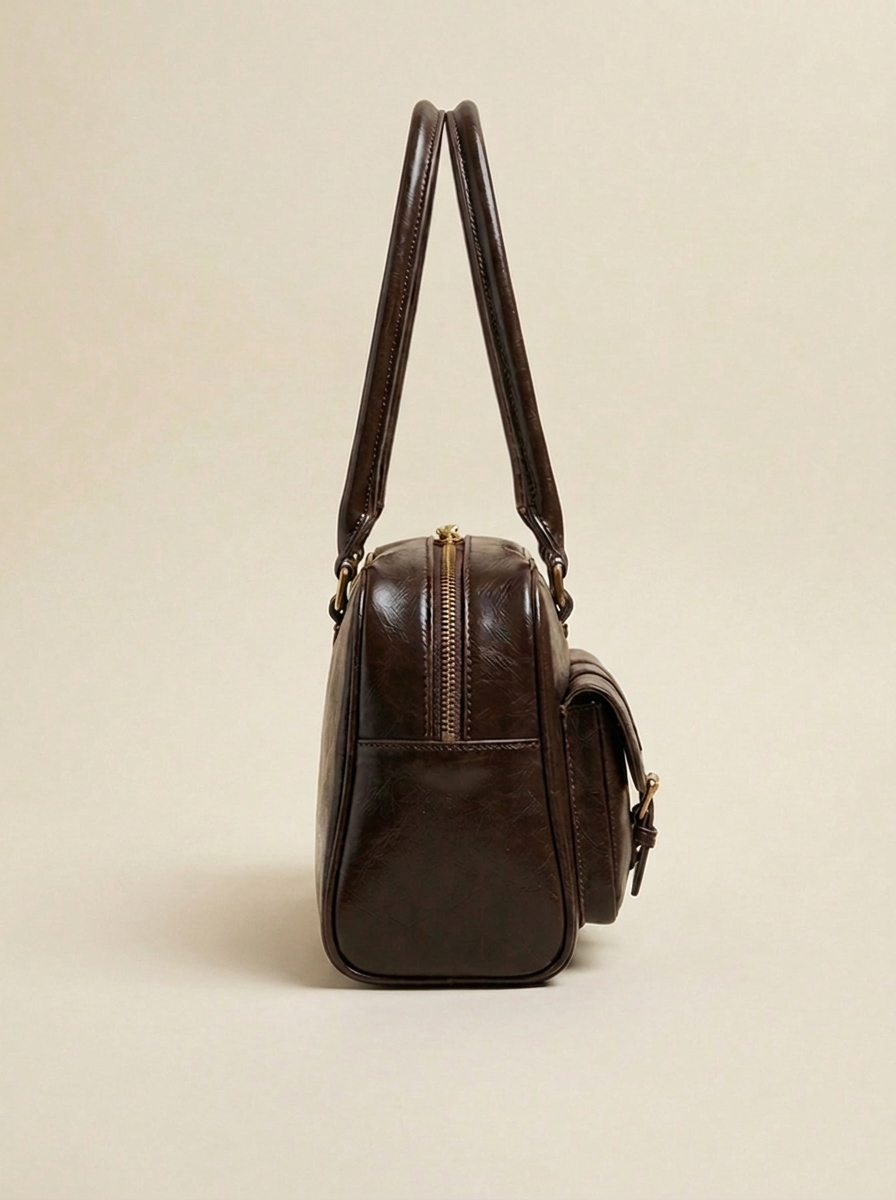 Bolso de cuero con múltiples bolsillos